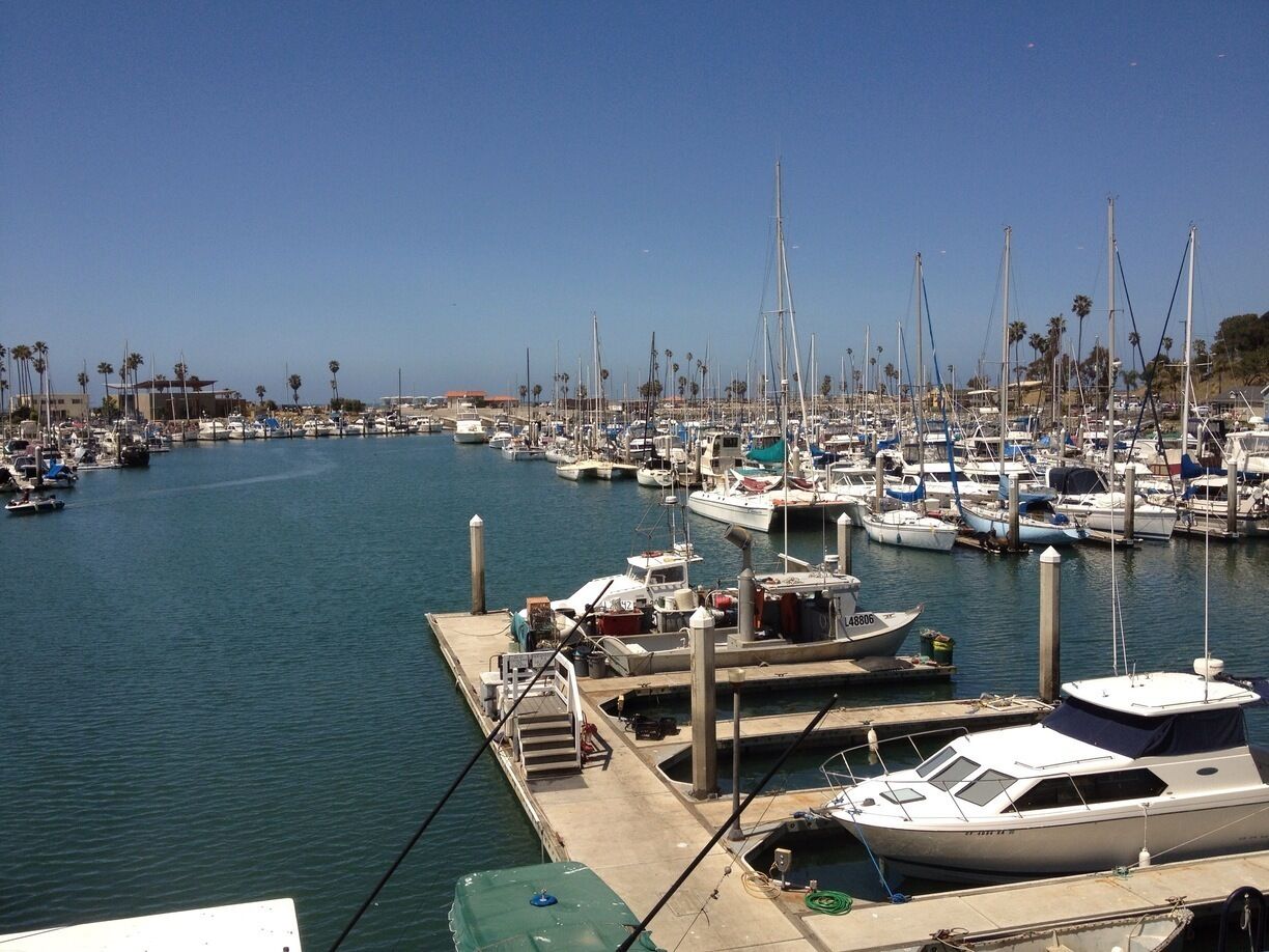 This Cape Cod style fishing village, complete with a lighthouse, accommodates more than 950 yachts and boats.  It has several family owned and commercial seafood restaurants, gift shops, and kiosks.  Beers served in a bucket and frosty margaritas are perfect on this hot day.
