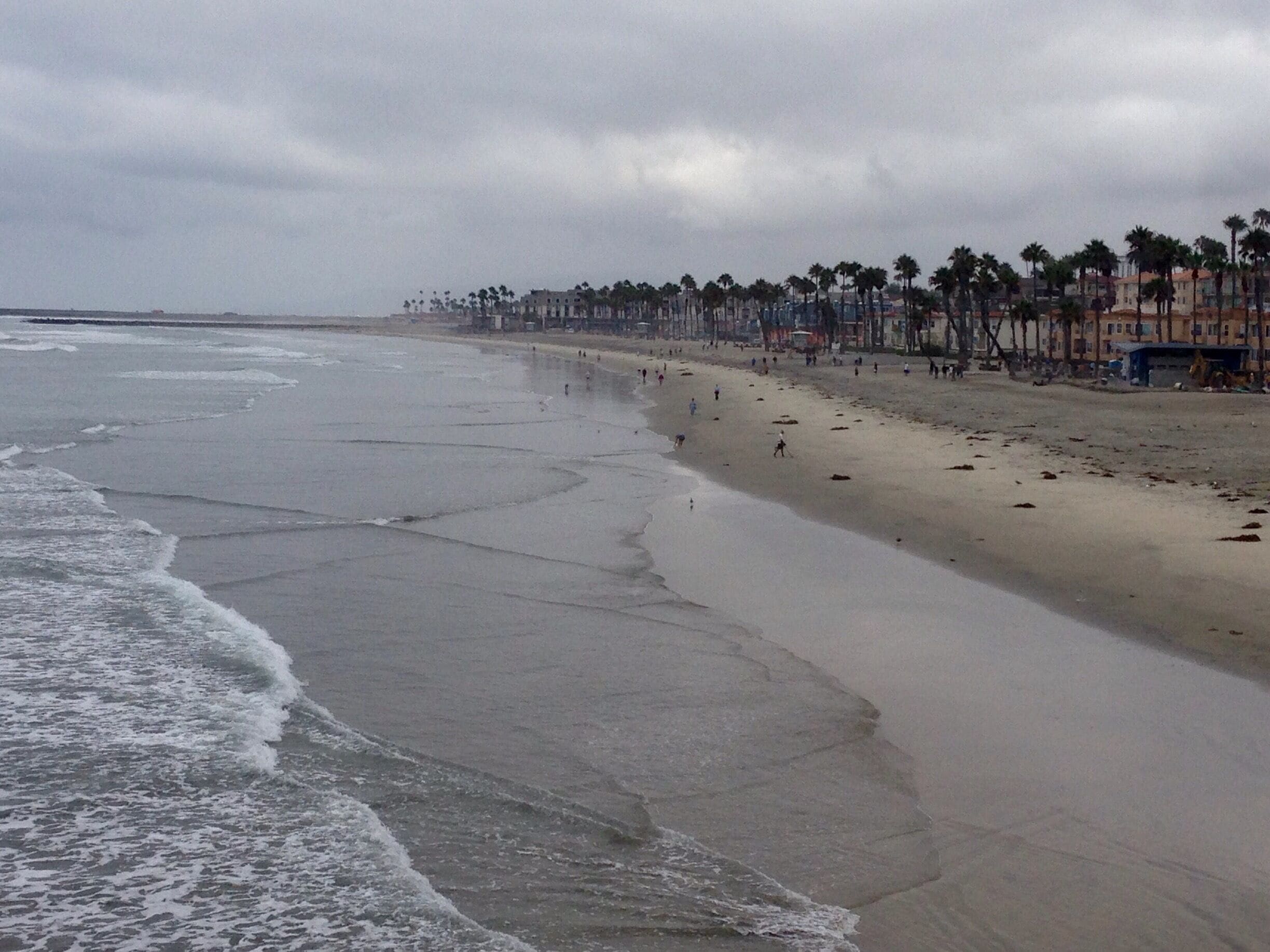 View of the beach from the pier. 