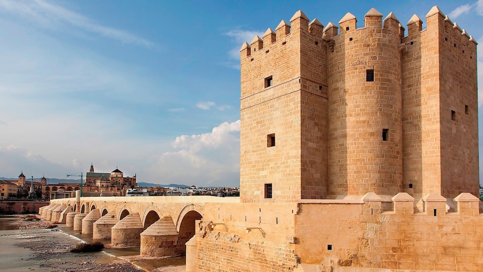 2,100 year old bridge, now a pedestrian walkway. The bridge was heavily reconstructed in the 10th century by the Moors, and their handiwork is largely what we see today. Standing guard over the bridge is the 12th Calahorra Tower.