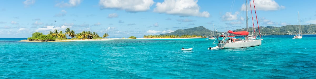 Turquoise sea and anchored yachts near Carriacou island, Grenada, Caribbean sea