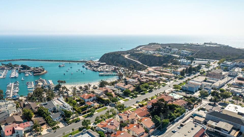 Aerial view looking out over Dana Point Harbor and Baby Beach