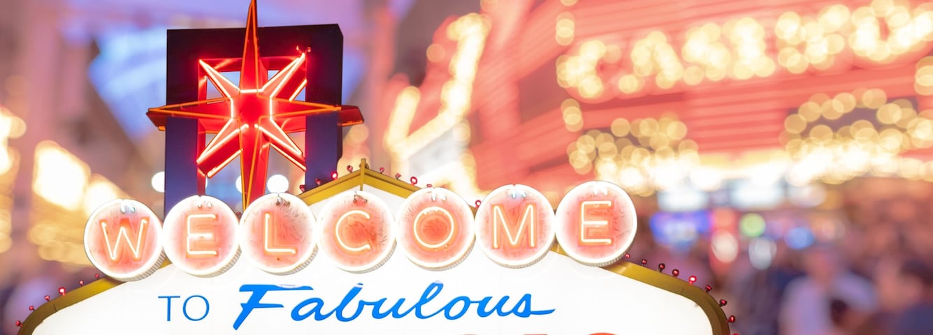 Famous Las Vegas sign with blur cityscape