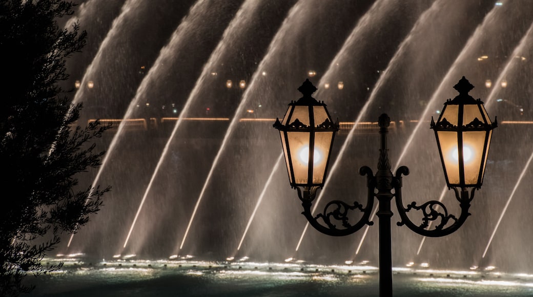 Old vintage lantern by the Bellagio Fountain lights at night tourist attraction