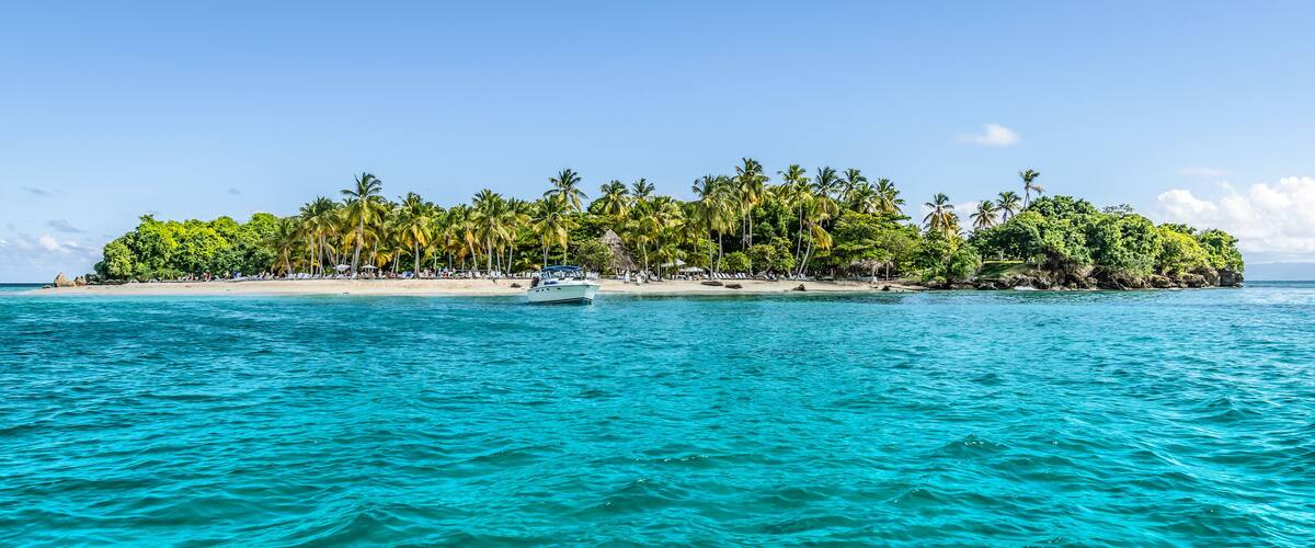 Cayo Levantado, Samana Bay, Dominican Republic. Panoramic view of Caribbean Islet with coconut palm trees and white sand beach.