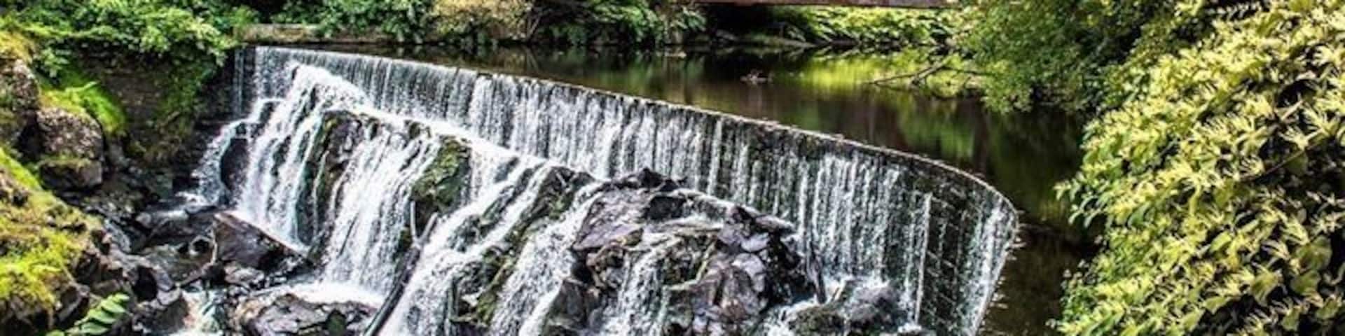 Yantic Falls Indian Leap in Norwich.. Yantic Falls is located on the Yantic River northwest of downtown Norwich, dropping 40 feet through a narrow slot now spanned by a railroad bridge and a footbridge. Good for urban hiking but a pretty waterfall to look at! #nature