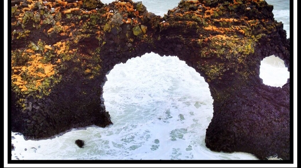 Near Olafsvik on the north side of the Snaefellsness peninsula you'll see a large statue of a Norseman. Park in that lot and take the 5-10 minute walk to the sea where you'll find this beautiful arch. Be careful not to go too close to the edge of the cliffs as we saw waves break against the cliffs and spray up over them. Had to be 100 feet up...amazing and powerful!
