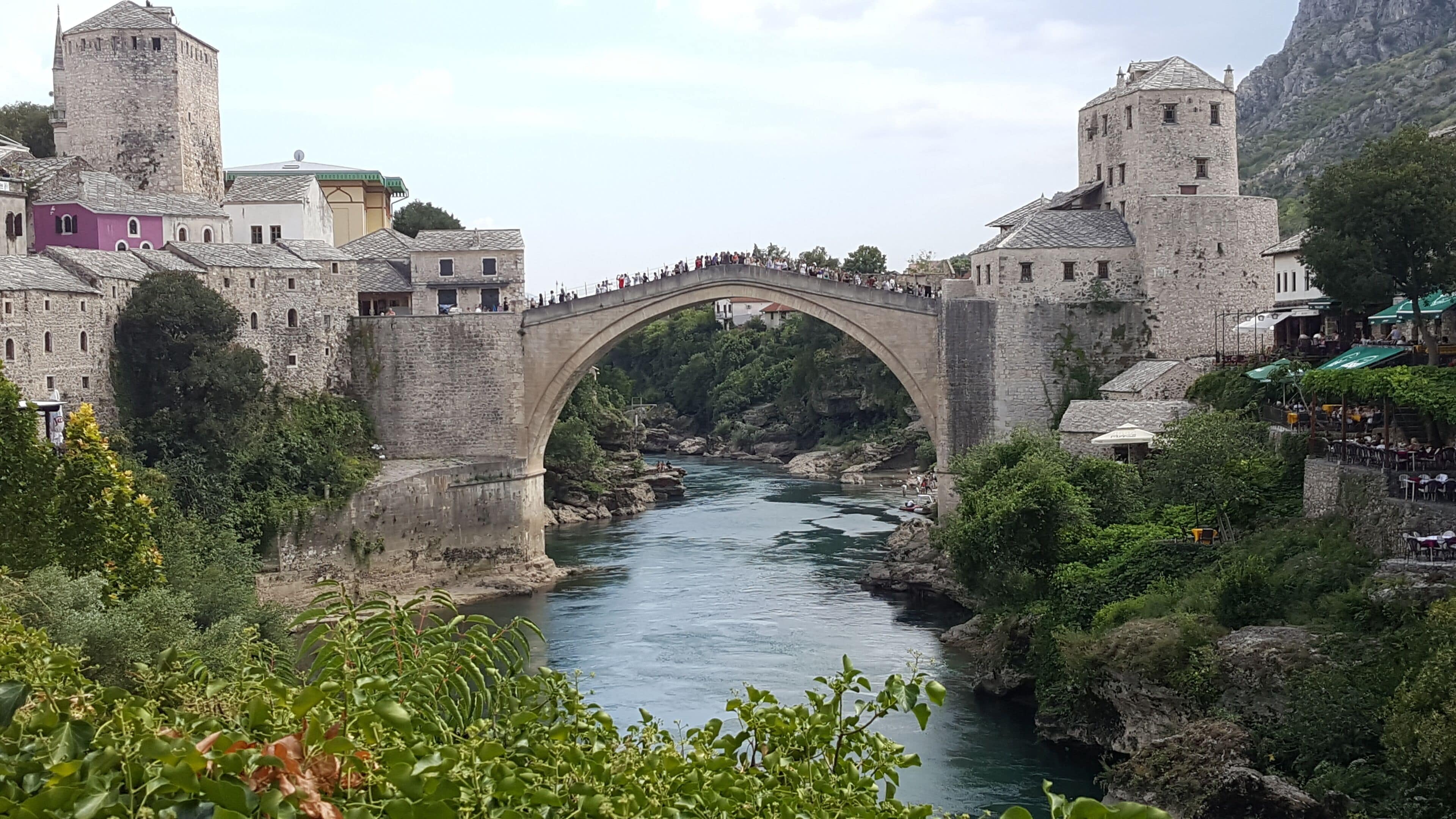 The Old Bridge, of Ottoman architecture, spans the Neretva River. The bridge was destroyed during the conflicts in 1993 and was restored by a committee established by UNESCO.

  -2018