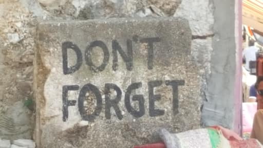 'Don't Forget' signs are found around the Old Town of Mostar. They are a reminder of the damage, the pain, and the courage to rebuild after the 1990s conflict.
-2018