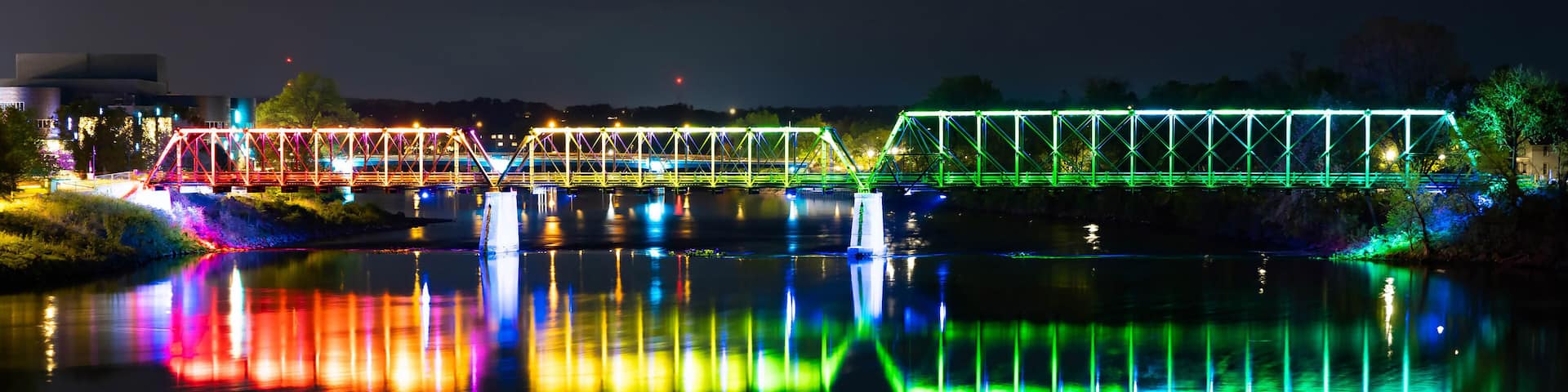 River Lights Bridge Illuminated at Night in Eau Claire
