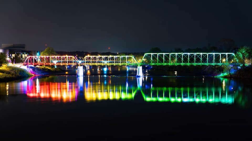 River Lights Bridge Illuminated at Night in Eau Claire