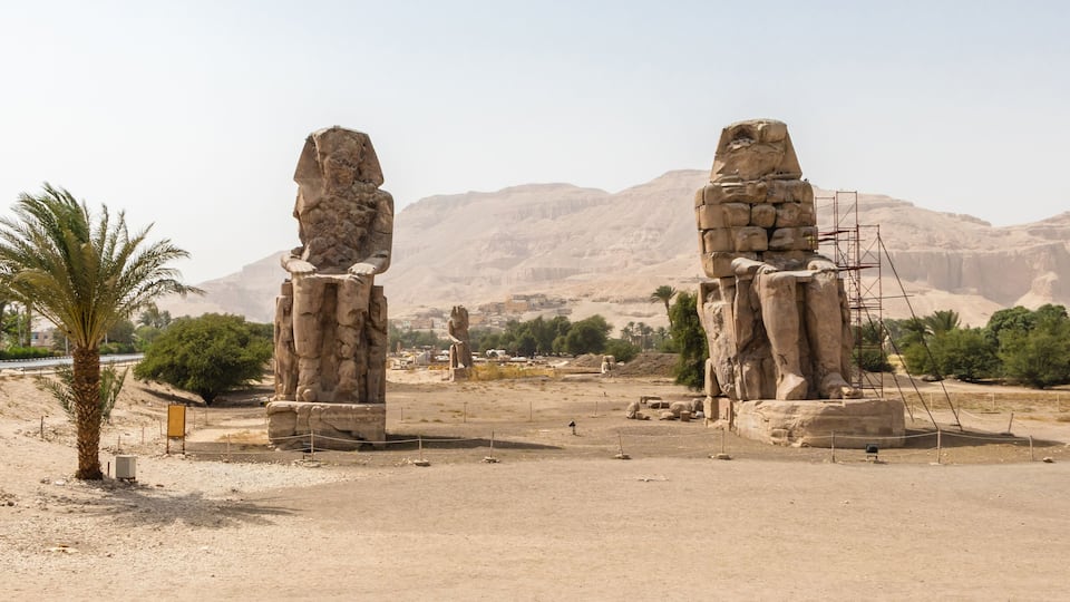 The Colossi of Memnon at the Thebes Necropolis on the west bank of the Nile, Luxor, Egypt