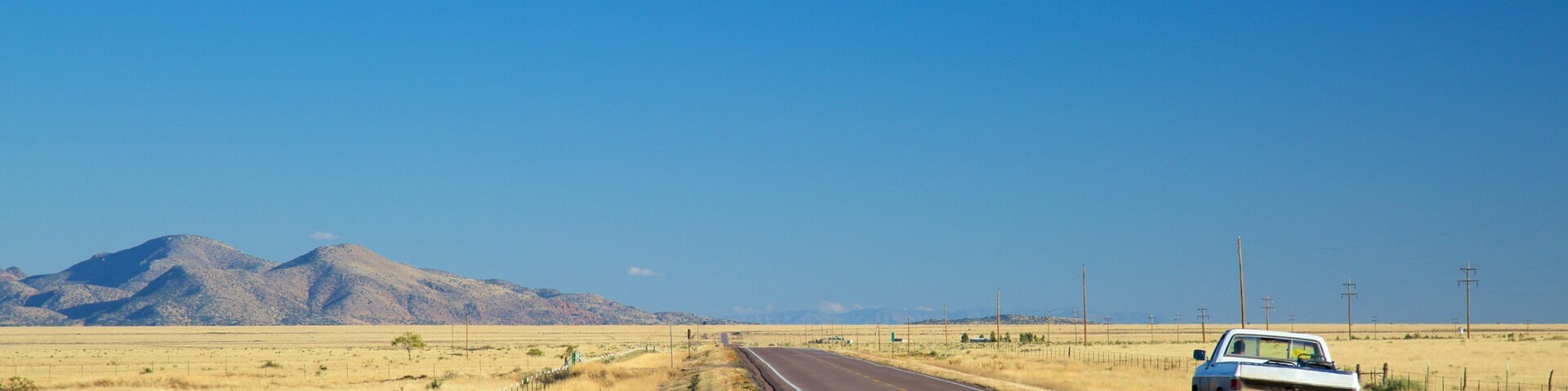 Socorro showing vehicle touring and farmland
