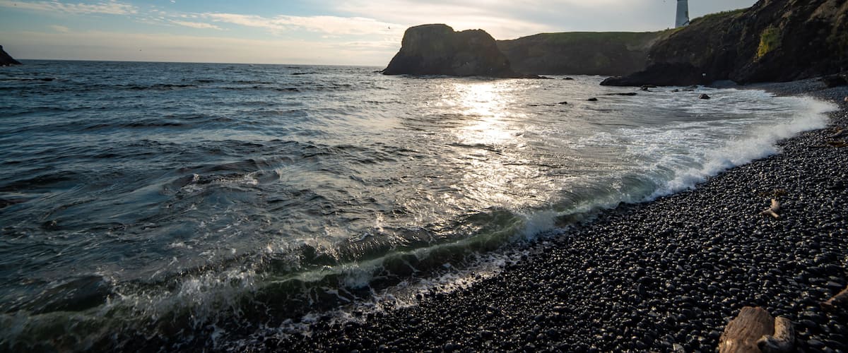 Perfect spot for a sunset along the central Oregon coast. In spring you can catch sea lions sunbathing on the volcanic rocks. This isn't the typical sandy beach, in fact it's mostly cobbles. Listening to the soothing tones of waves crashing over the rocks is a sound you won't soon forget.