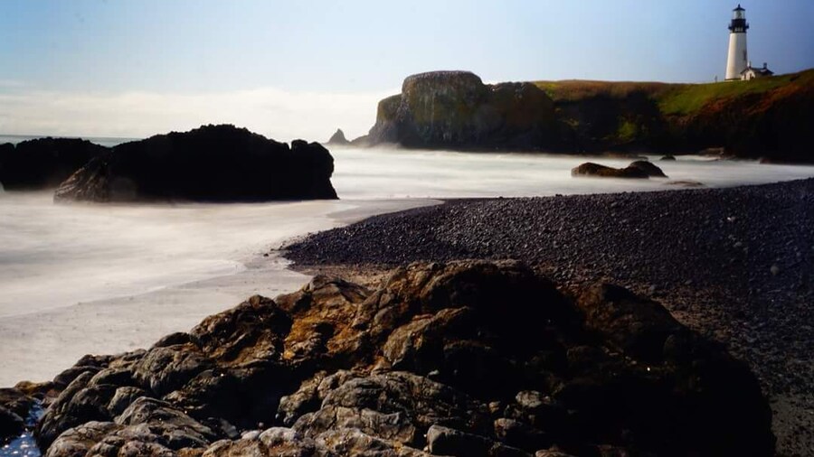 Beautiful Yaquina Bay lighthouse from Cobble Beach.