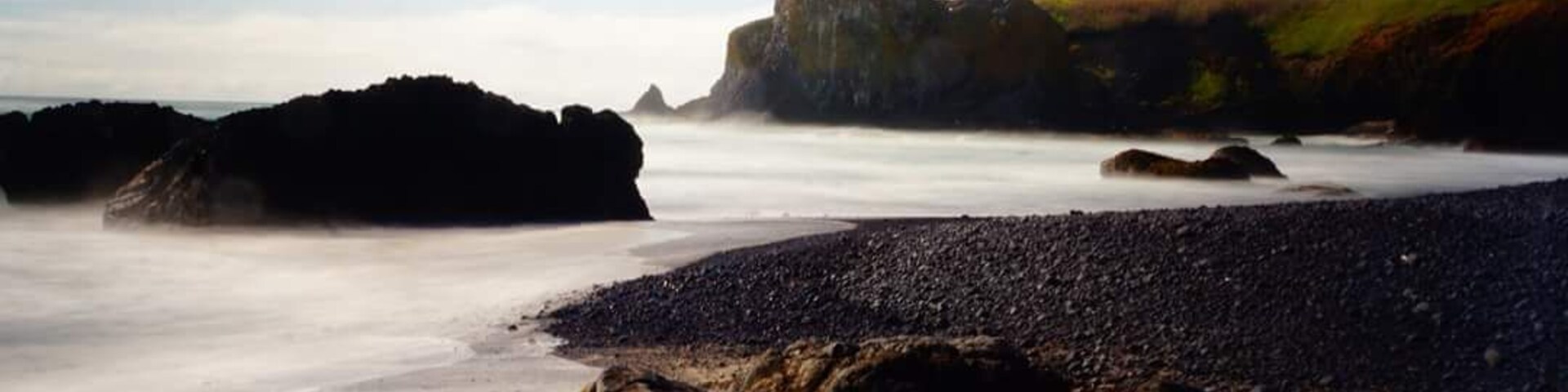 Beautiful Yaquina Bay lighthouse from Cobble Beach.