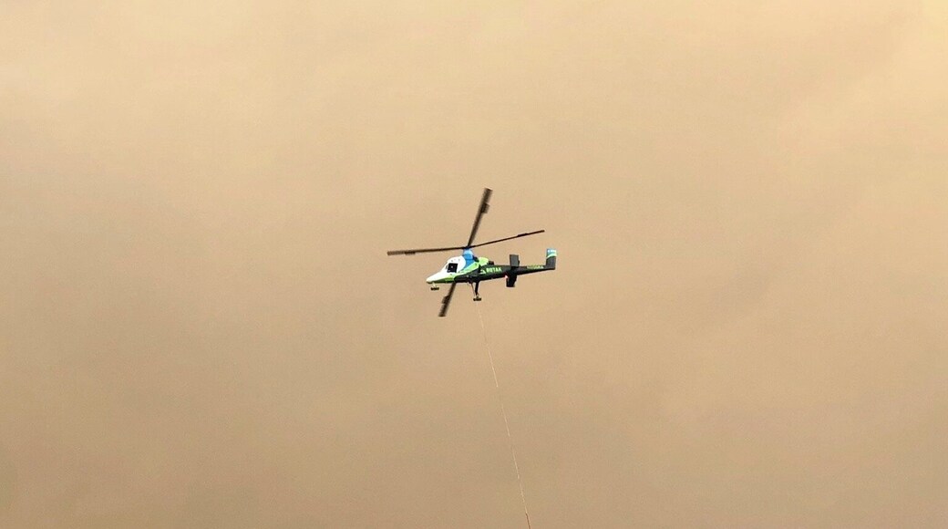 Fire all around us. They are working on getting them extinguished. Slow going and the air is bad.