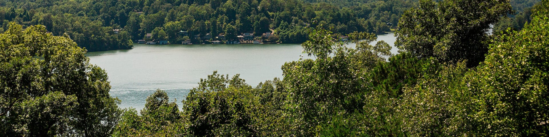 Lake Lure, NC Aerial Above View Of Lake and Chimney Rock Mountain