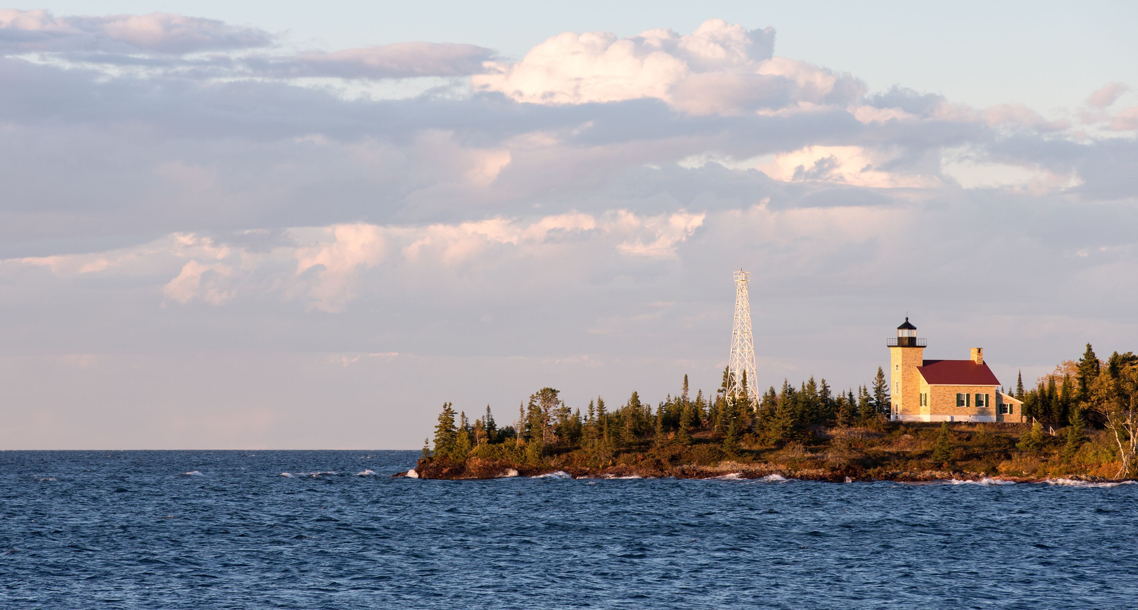 Lighthouse and Gathering Clouds in Evening Light