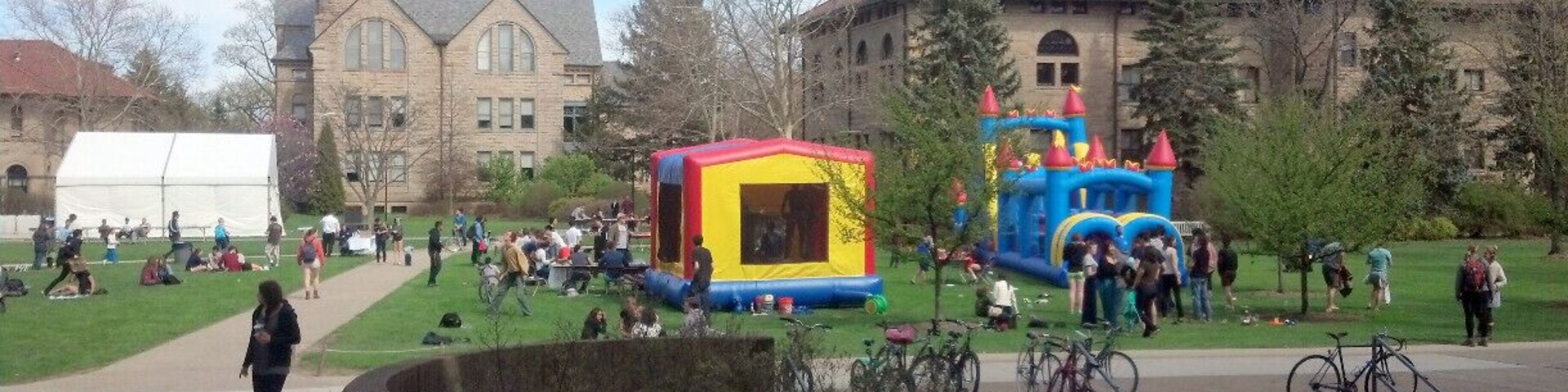 Wilder Bowl, the heart of Oberlin College, is a large, open grassy area where the students hangout on a nice day. It also hosts "stress-relieving" bouncy tents and obstacle courses during mid-terms.