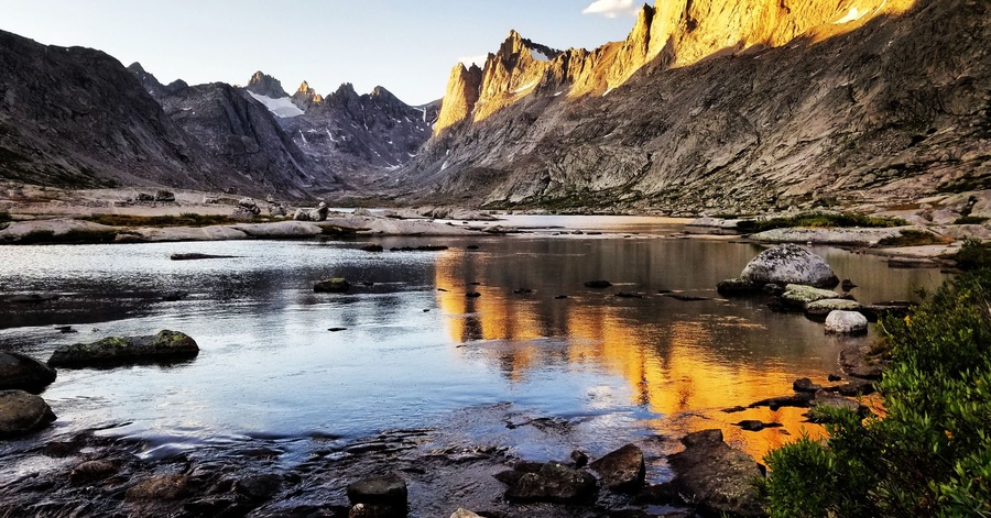 17 miles in Wyoming's Wind River Range to get to this spot. My two buddies had crashed out in their tent and I had the solitude of the upper basin all to myself. The fading light on the water, the smell of crisp mountain air, and the reverie of the day's journey made this an unforgettable moment in a truly unforgettable place. #adventure