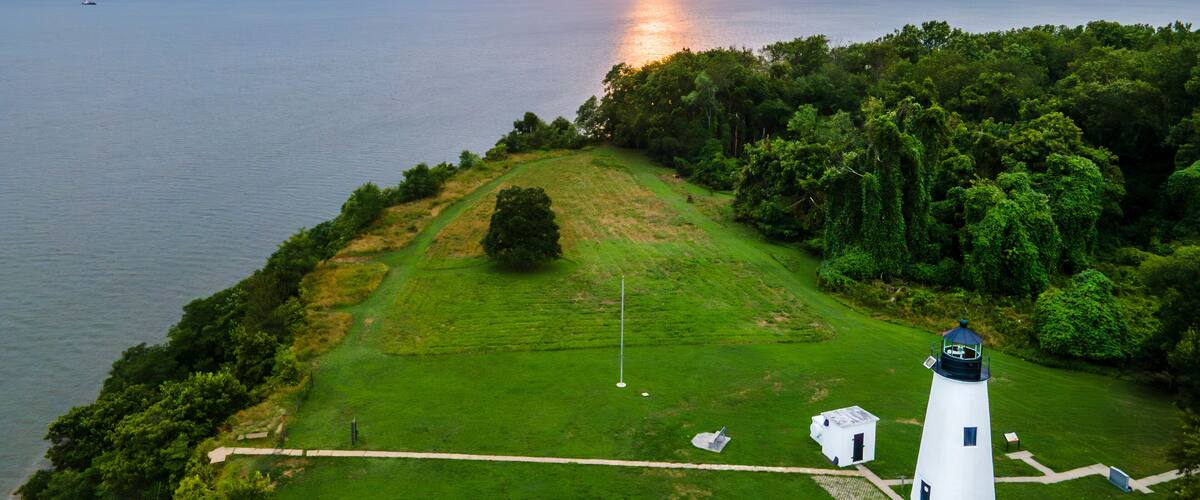Aerial View of the sunset overlooking the Chesapeake Bay at Turkey Point Lighthouse in North East, Maryland, United States.