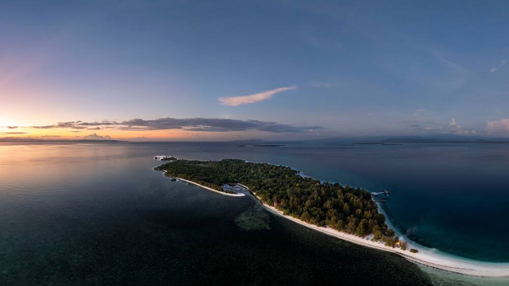 Dodola Island, one of the most beautiful places to go in Morotai, one of the island on North Maluku, Indonesia. Dodola island is divided into 2 island and it will connected the the sea tide is low .