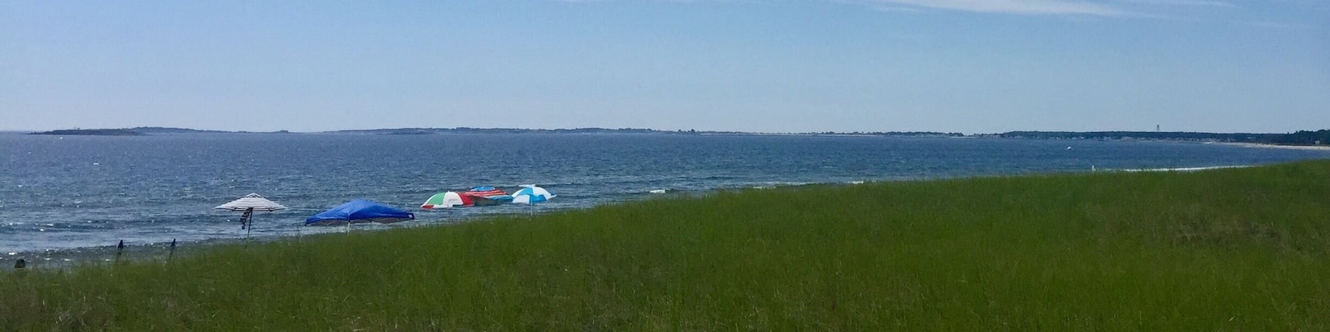 Walking on the boardwalk over the dune grass to Ocean Park Beach.