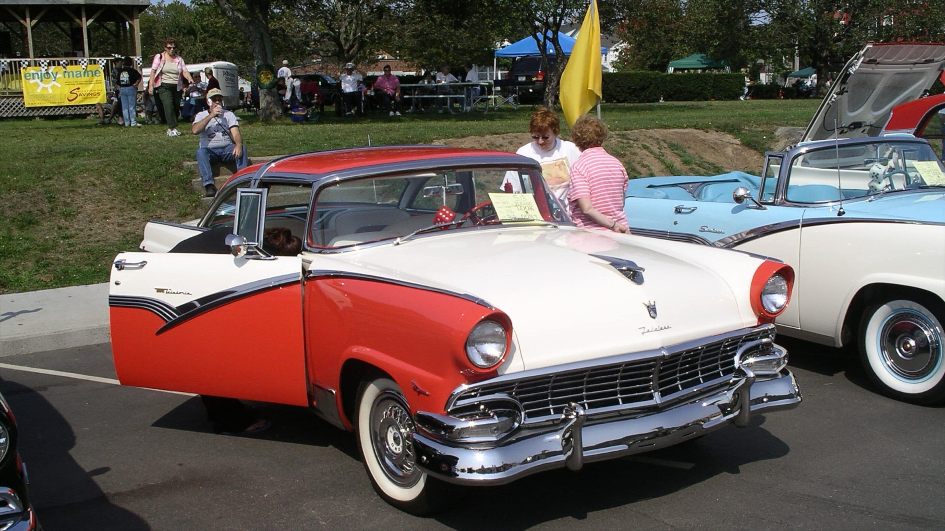 Old Orchard Beach featuring street scenes and a city as well as a small group of people