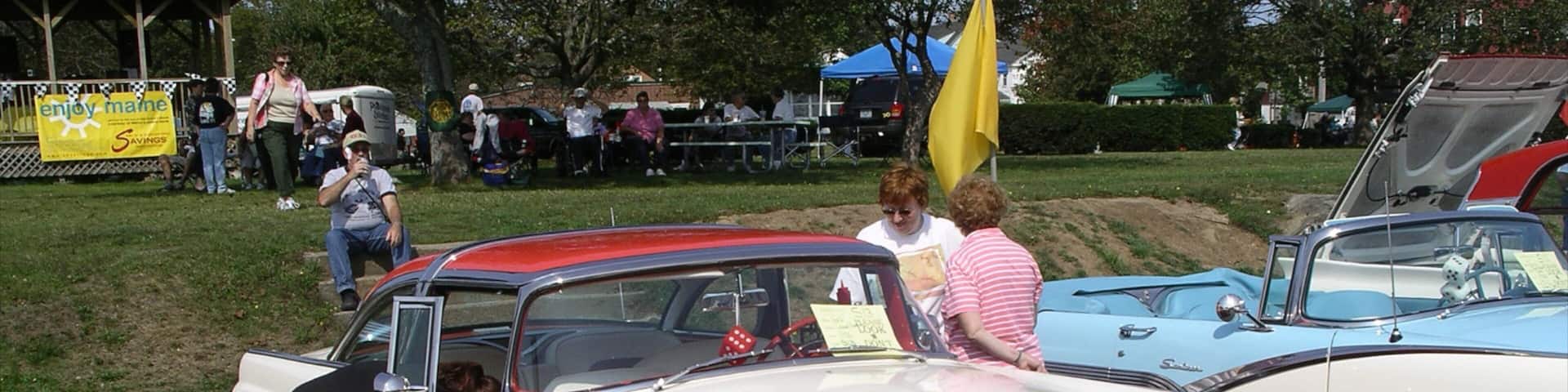 Old Orchard Beach featuring street scenes and a city as well as a small group of people