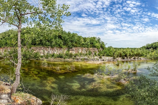 Once an active limestone quarry near Greencastle, Indiana, the site is now the DePauw Nature Park. This photograph was taken in Spring from the rim of the excavated quarry cliffs.