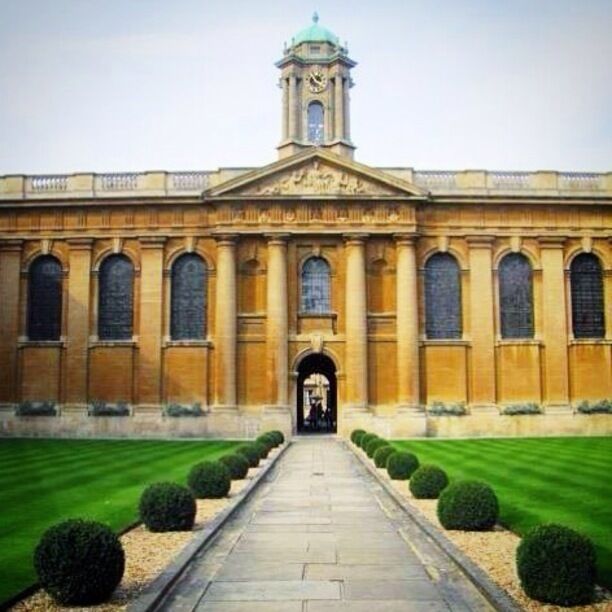 Quite symmetrical. This was taken while I was taking a casual stroll through Oxford. It was quite busy although school was out at the time. Beautiful grounds! Oxford is only an hr or so from London and is so worth a day trip.