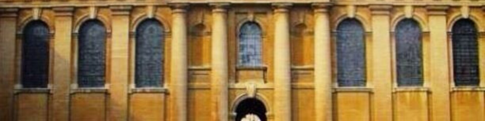 Quite symmetrical. This was taken while I was taking a casual stroll through Oxford. It was quite busy although school was out at the time. Beautiful grounds! Oxford is only an hr or so from London and is so worth a day trip.