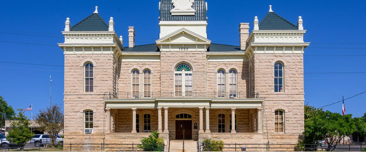 Town Square and Historic Crockett County Courthouse built in 1902. Ozona City in Crockett County in West Texas, United States