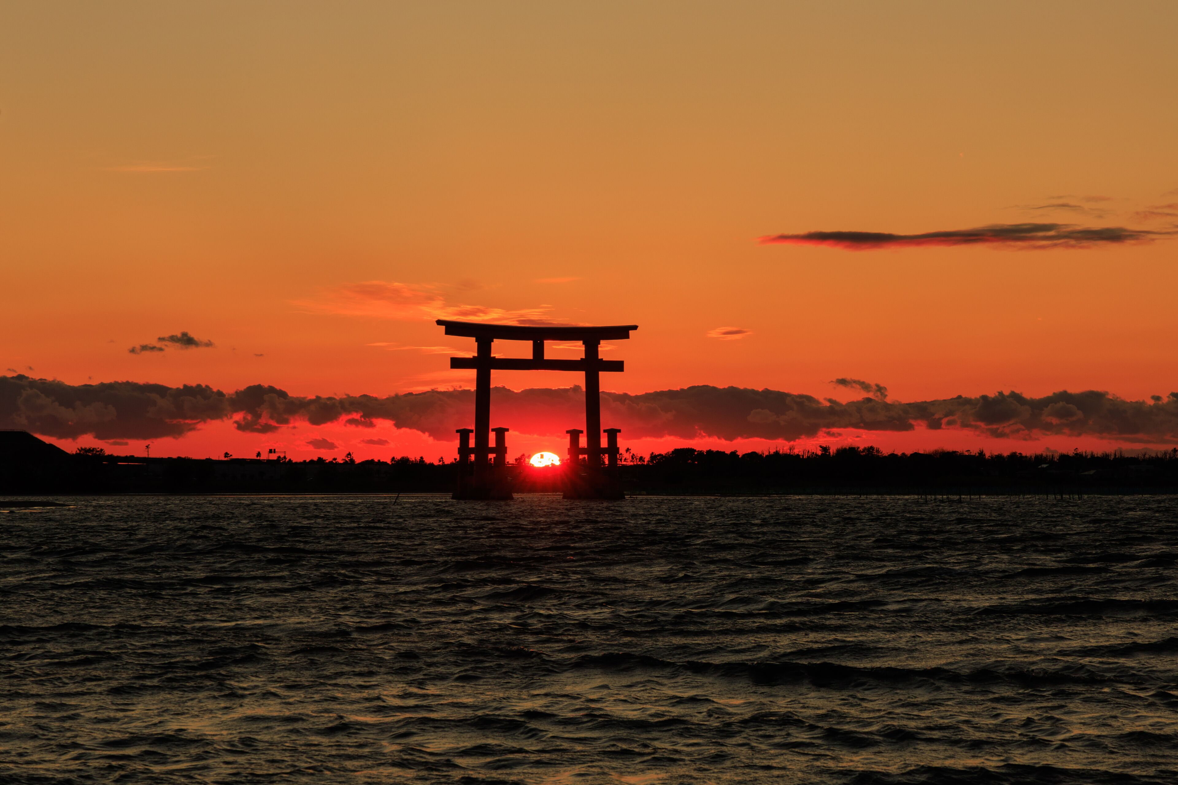 Torii gate silhouette at sunset on New Year's Day, Bentenjima, Hamamatsu, Shizuoka, Japan
