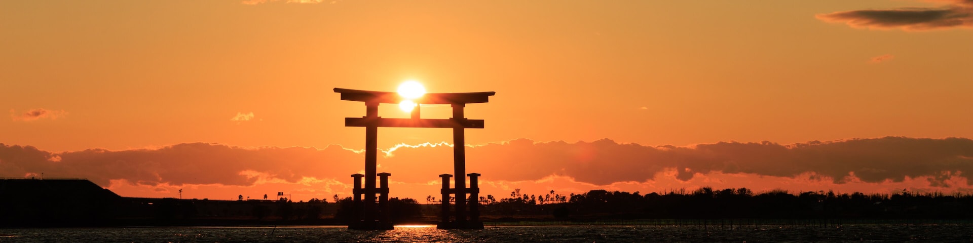 Torii gate silhouette at sunset on New Year's Day, Bentenjima, Hamamatsu, Shizuoka, Japan