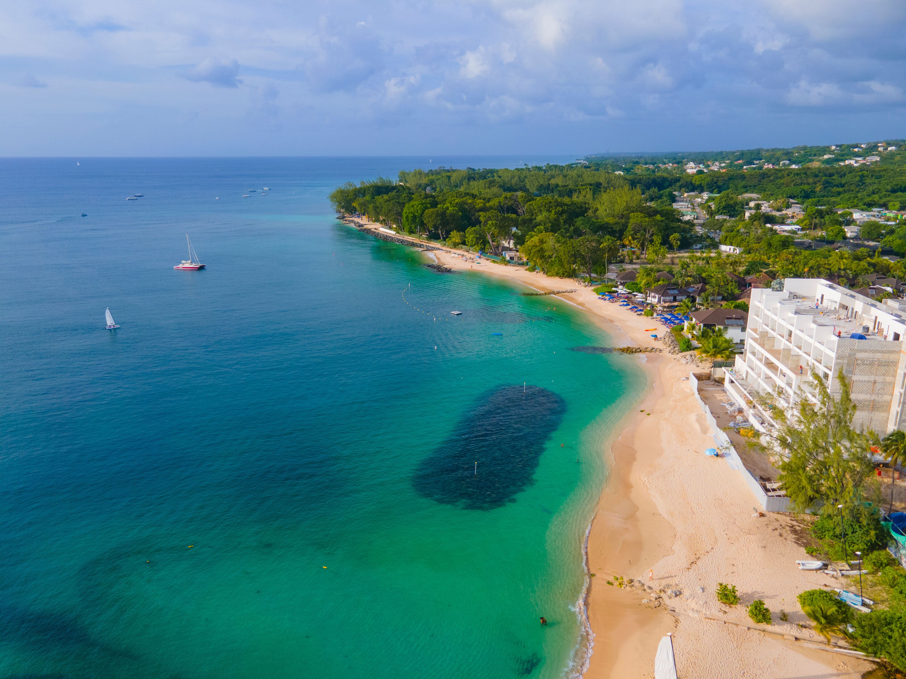 Holetown Beach and coastal resorts aerial view in historic city center of Holetown, St. James Parish, Barbados. 