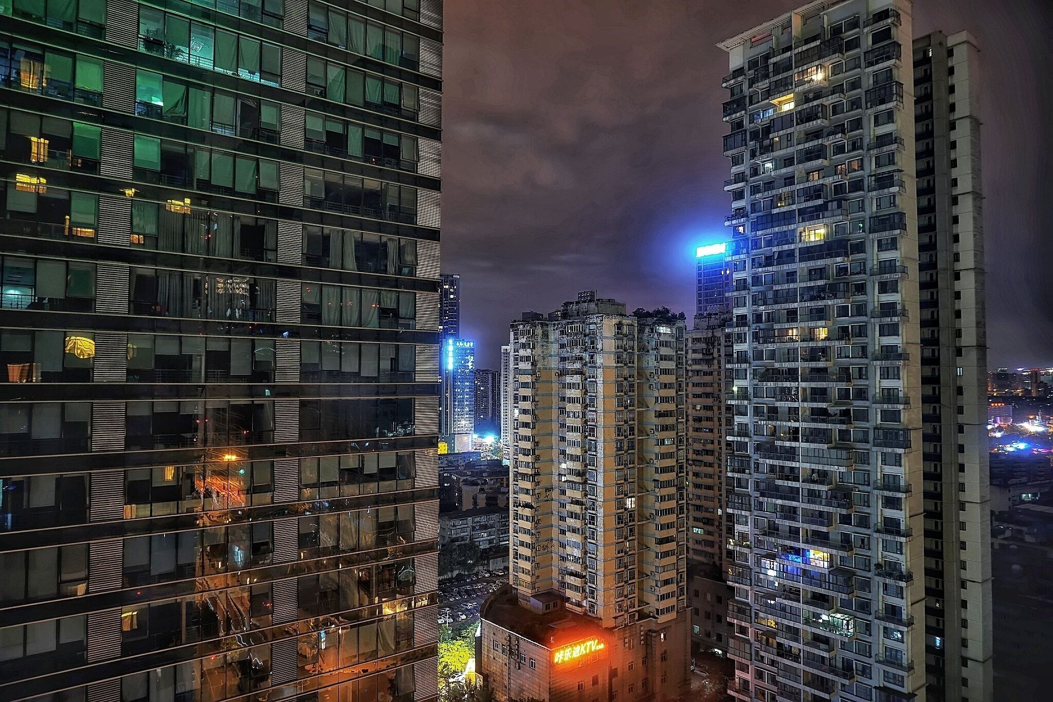 This was the view from our hotel room during our visit to Chengdu, China. At 7,517 miles away from New York City, this is the farthest away from home that I've ever been. 
If you want to visit Chengdu, and think you would enjoy this view, book yourself at the Holiday Inn Chengdu Oriental Plaza, located at 231 Zhiquanduan, East Avenue, Jinjiang District, Chengdu. I found this hotel to be quite comfortable and the staff are very friendly and helpful. 