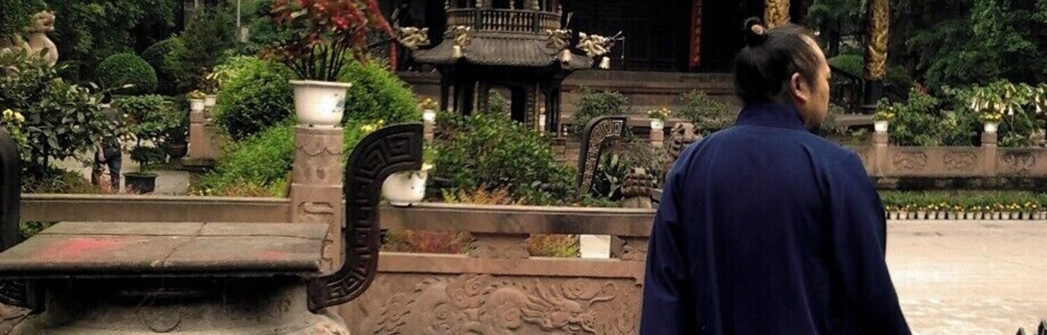 Entering the Green Ram Taoist Temple in Chengdu, the oldest and largest in the city.