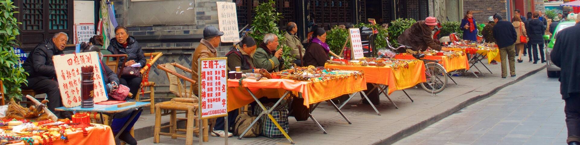 Chengdu featuring heritage elements as well as a small group of people