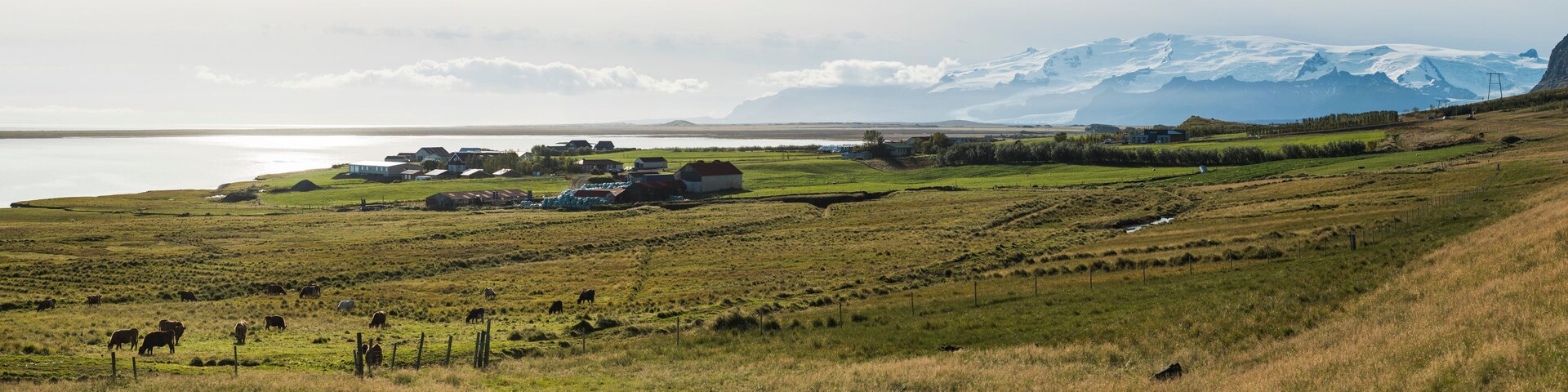 Hali, a small village 13km from Jokulsarlon, with Vatnajokull Glacier behind, Iceland, Europe