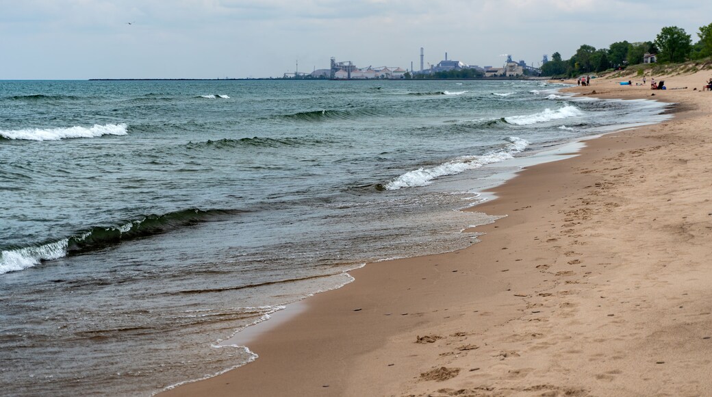 Indiana Dunes National Park along the southern shore of Lake Michigan. West Beach area, a popular beach portion of the park. Cleveland Cliffs, U.S. Steel’s Midwest Plant and Port of Indiana.