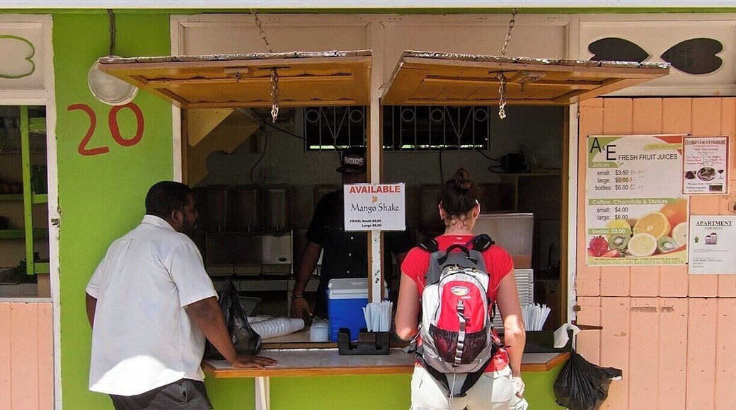 A&E Fresh Fruit Juices is the place to grab a Mango Shake on a hot afternoon. They set up in The Shacks - a parallel strip of rented stalls from which local vendors cook and sell food (mostly Caribbean style), snacks, souvenirs and more. Quick and easy stop, complete with covered picnic tables and (pay) restrooms.