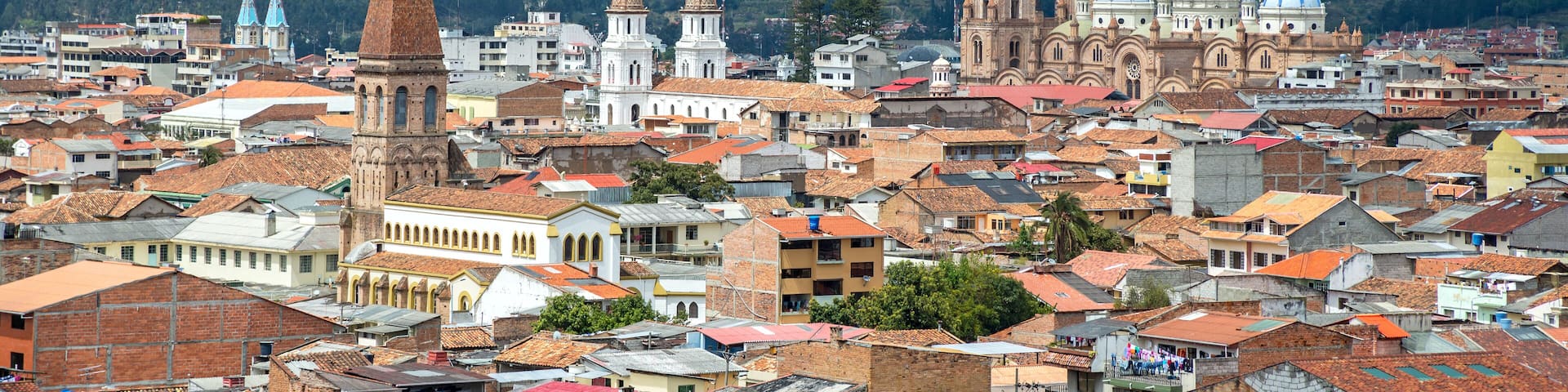 View of the city of Cuenca, Ecuador, with it's many churches, on a cloudy day