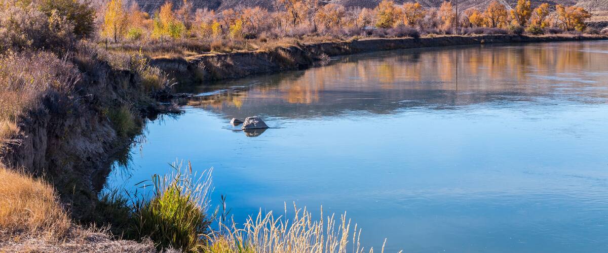 Beautiful autumn river landscape in sunny day. Location is Green River in Wyoming, USA