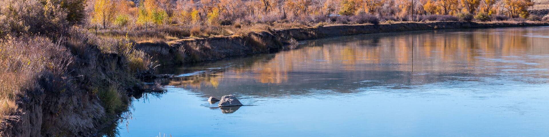 Beautiful autumn river landscape in sunny day. Location is Green River in Wyoming, USA
