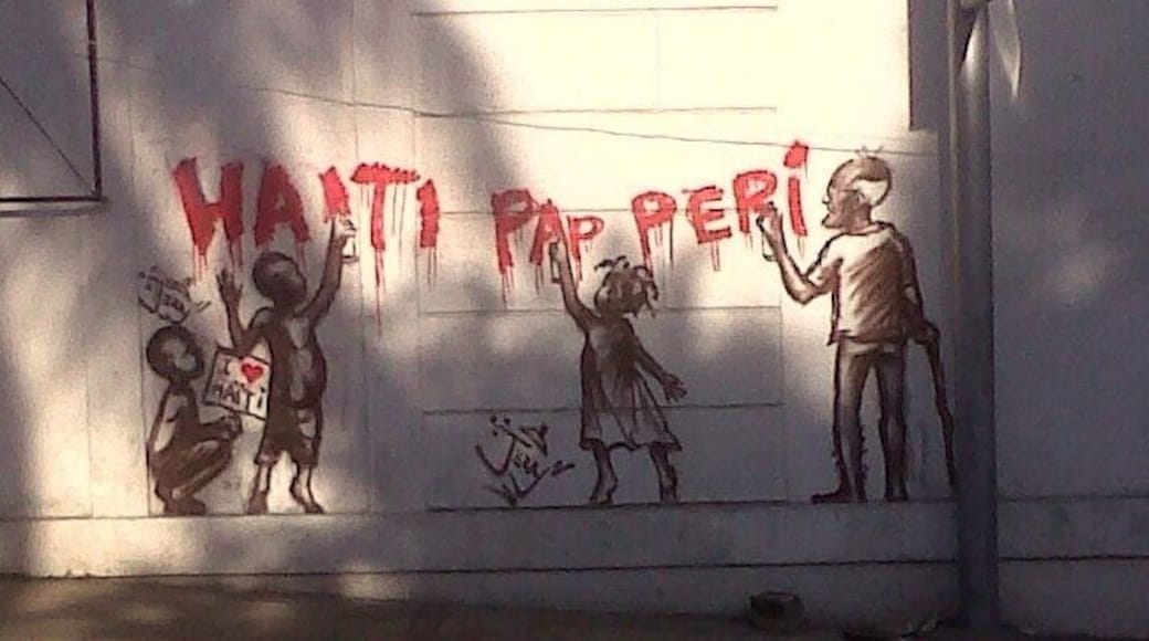 The first of a series of photographs of street art by Jerry. Roughly translated it says "Haiti will survive". I took the series while working in Haiti from April, 2010 to Dec. 2011.