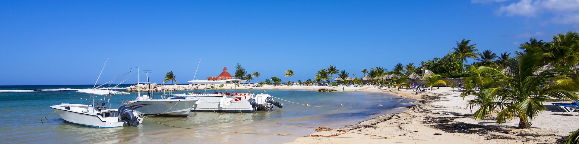 Jamaica, Runaway Bay, beach with motorboats; Shutterstock ID 390700726; Purchase Order: -