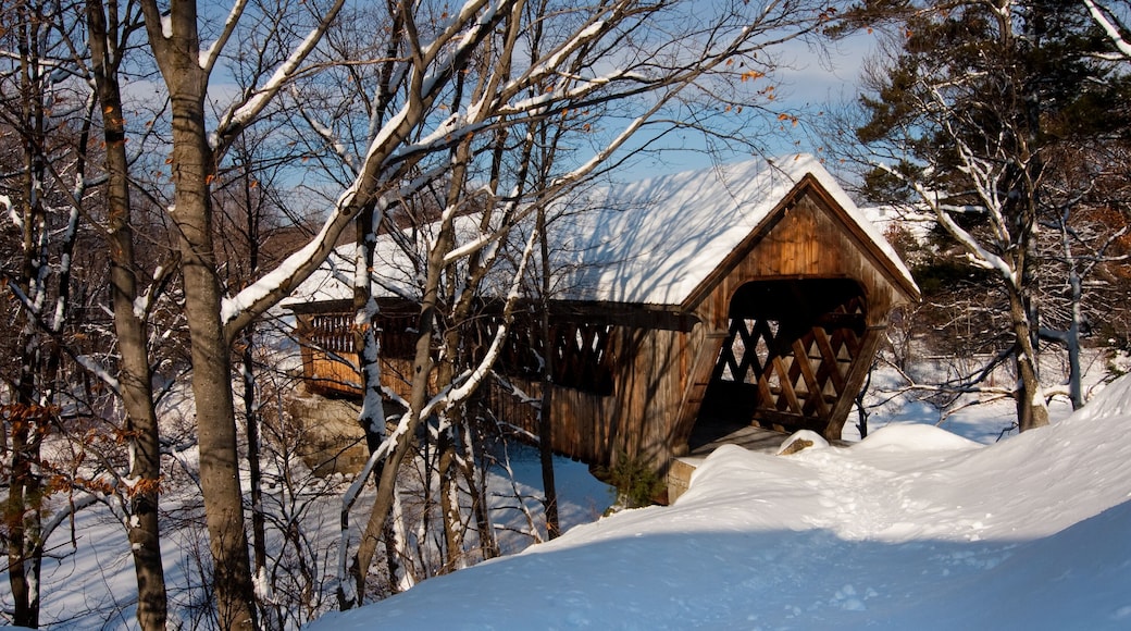 Snow covered Henniker Bridge in New England. The bridge is located near New England College in New Hampshire.