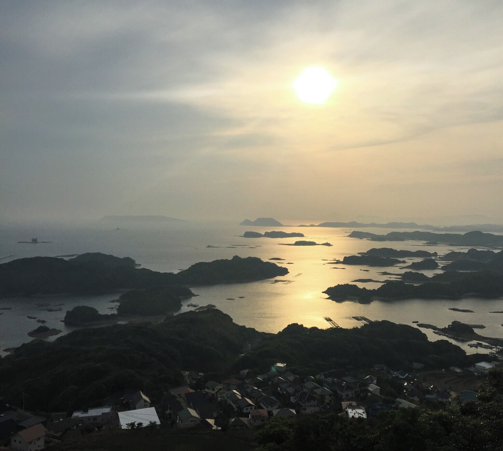 Top of 99 Islands Lookout, overlooking the Kujukushima Islands of Sakai National Park.  This is where the beginning scenes of the movie "The Last Samurai" with Tom Cruise was filmed.  Its about a 15 minute drive from Sasebo or about 45 minute-1 hour walk.  It's a perfect destination to take in the sunset.