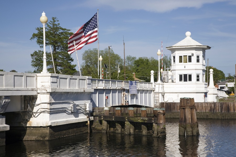American Flag flying over white bridge in Pocomoke City, the Eastern Shore of Maryland